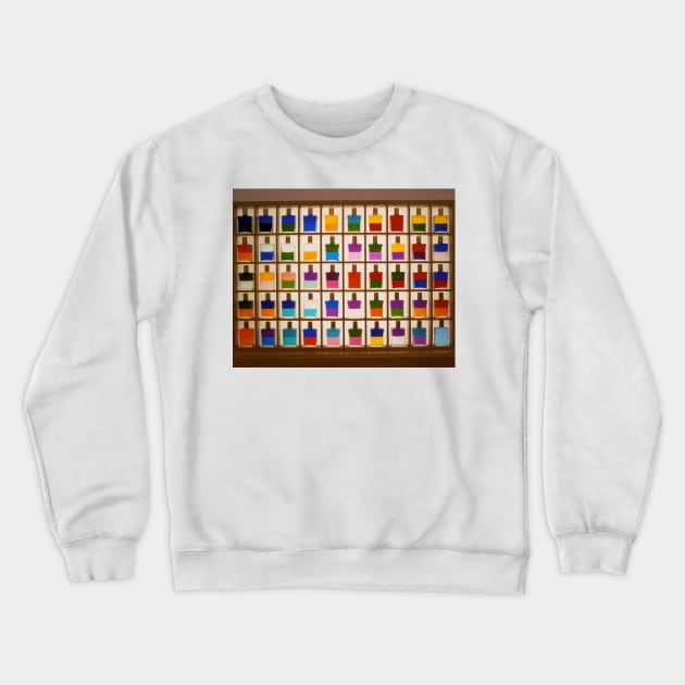 View of bottles used in Aura Soma colour therapy (M744/0018) Crewneck Sweatshirt by SciencePhoto